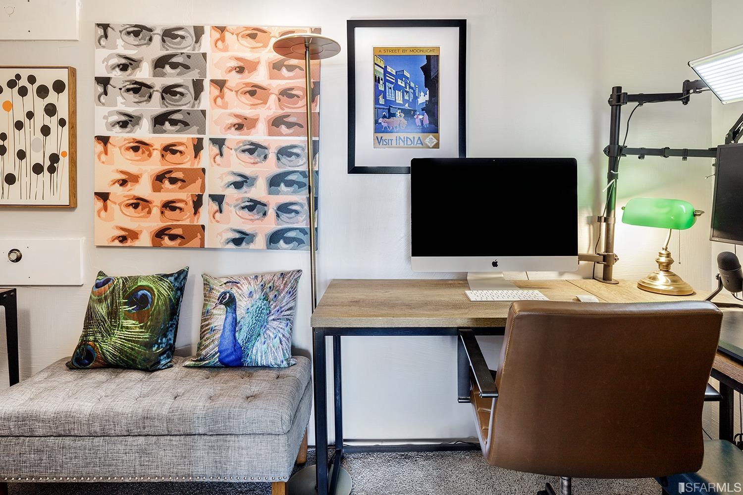 728 Alabama Street, Unit 205 San Francisco, CA 94110 - Photo 14 of 19 a living room with furniture and a flat screen tv