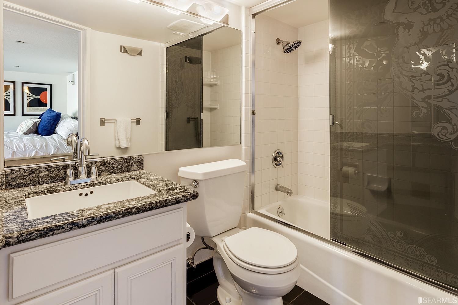 728 Alabama Street, Unit 205 San Francisco, CA 94110 - Photo 16 of 19 a bathroom with a sink toilet and shower