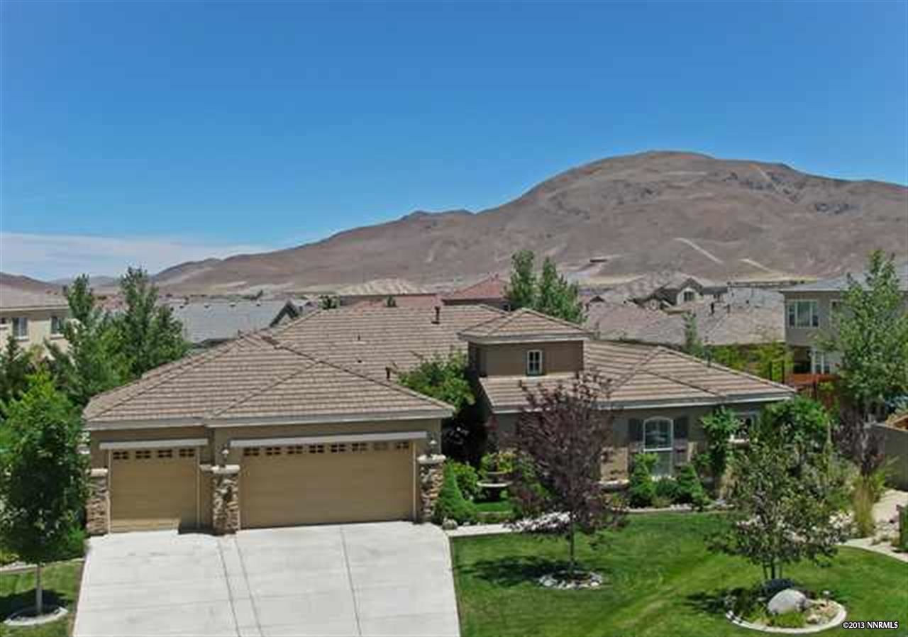 1655 Picket Court Reno, NV 89521 - Photo 1 of 1 an aerial view of a house with a garden