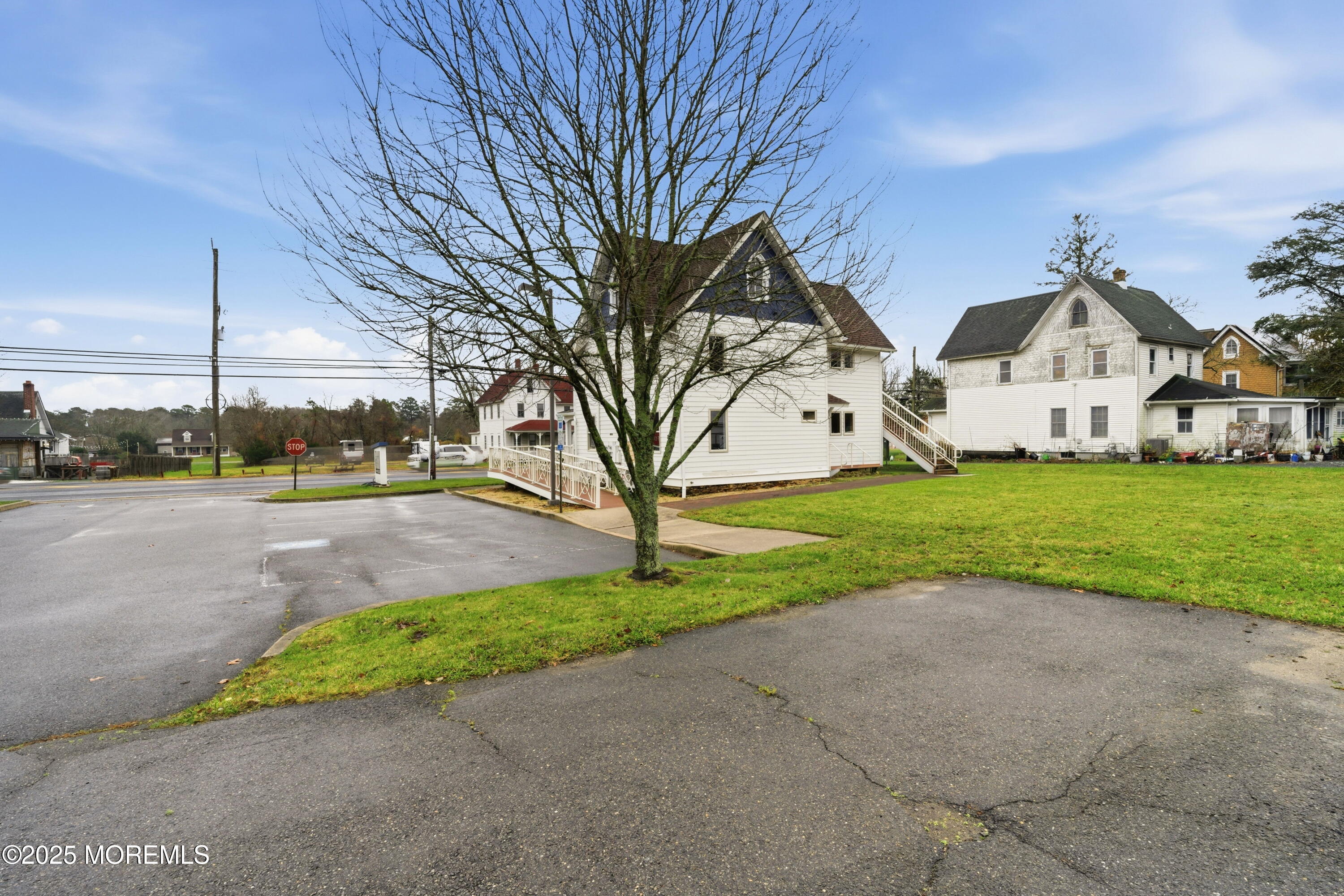 400 Main Street, Unit 2 West Creek, NJ 08092 - Photo 19 of 22 a view of a street with houses