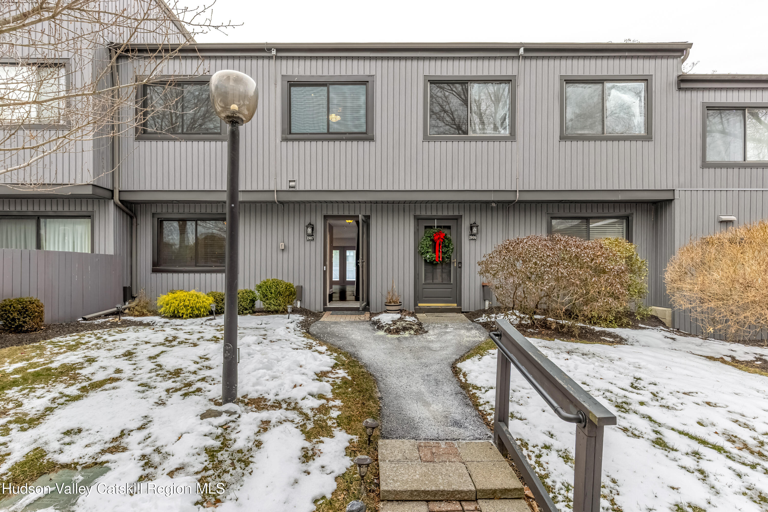1907 Magnolia Walk Poughkeepsie, NY 12603 - Photo 1 of 36 a view of open kitchen with granite countertop a sink and chairs