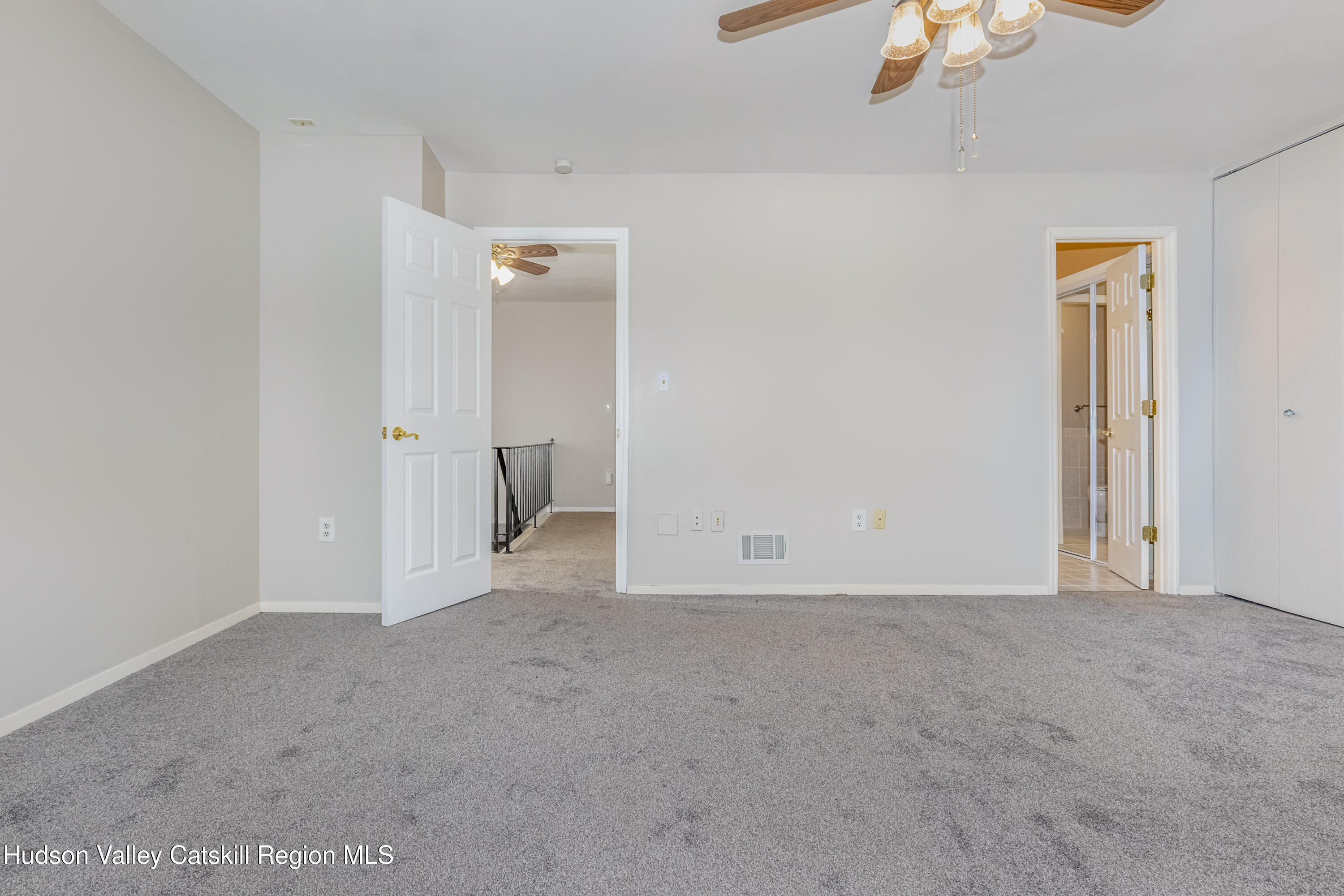 1907 Magnolia Walk Poughkeepsie, NY 12603 - Photo 19 of 36 a view of an empty room and chandelier fan