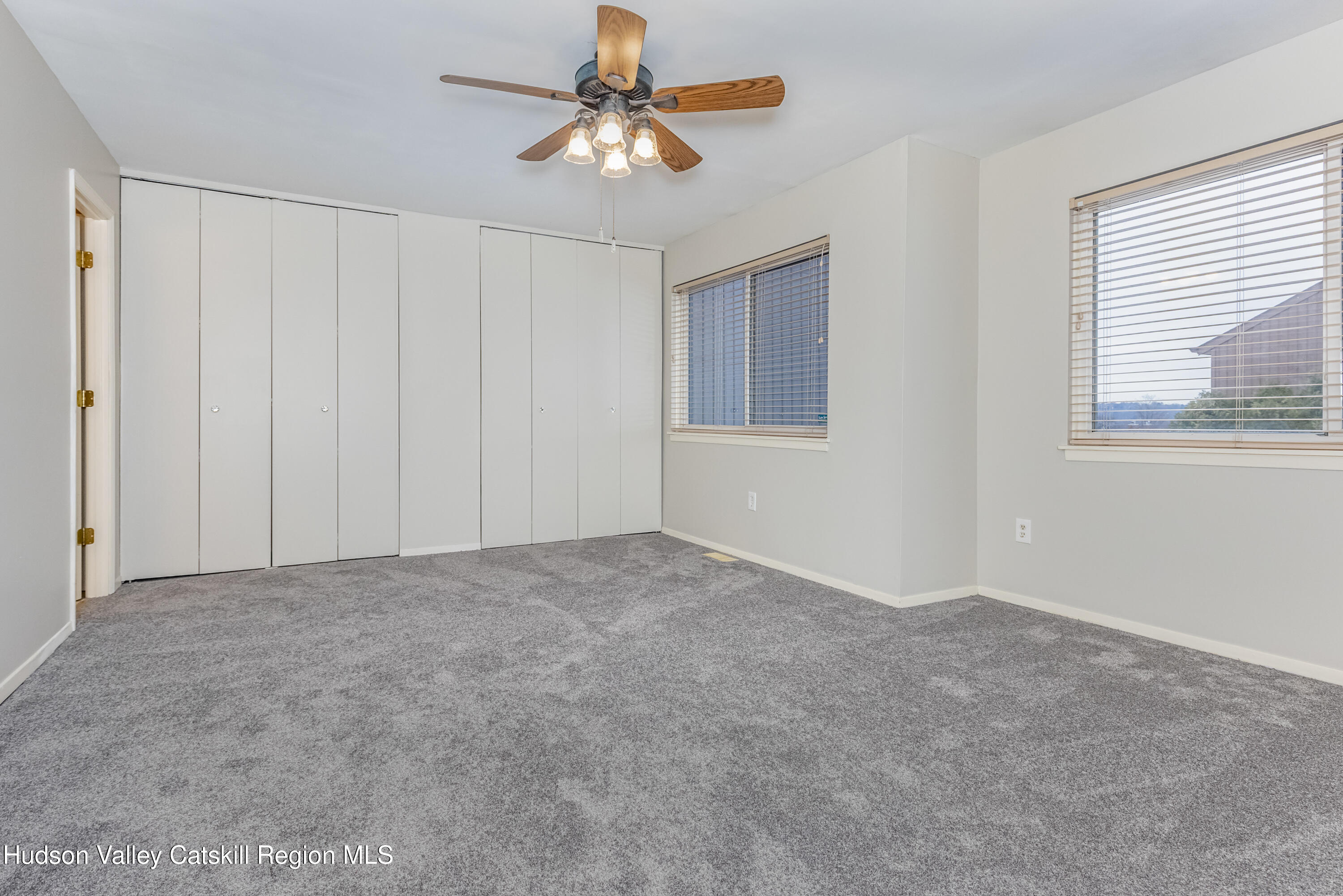 1907 Magnolia Walk Poughkeepsie, NY 12603 - Photo 20 of 36 a view of an empty room with a window