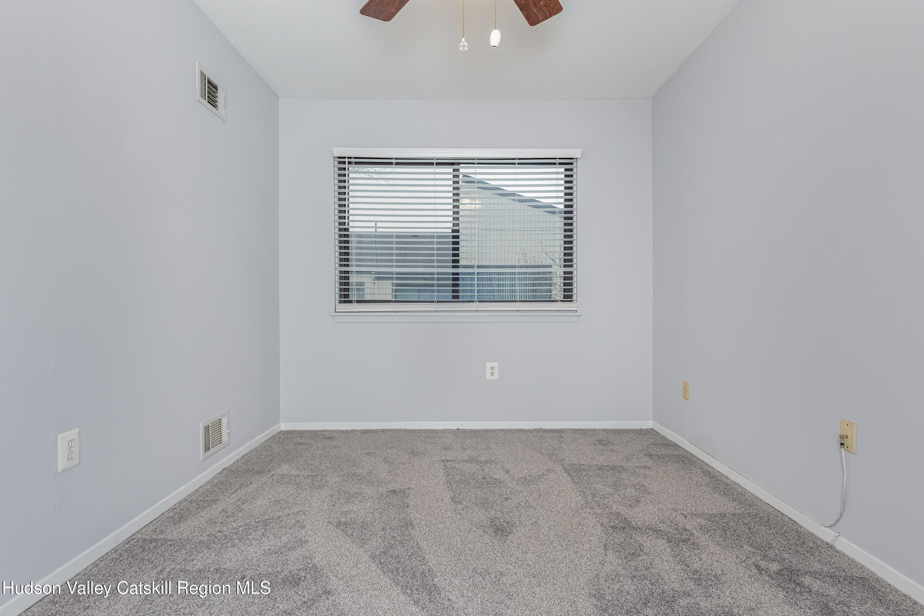 1907 Magnolia Walk Poughkeepsie, NY 12603 - Photo 32 of 36 an empty room with a window