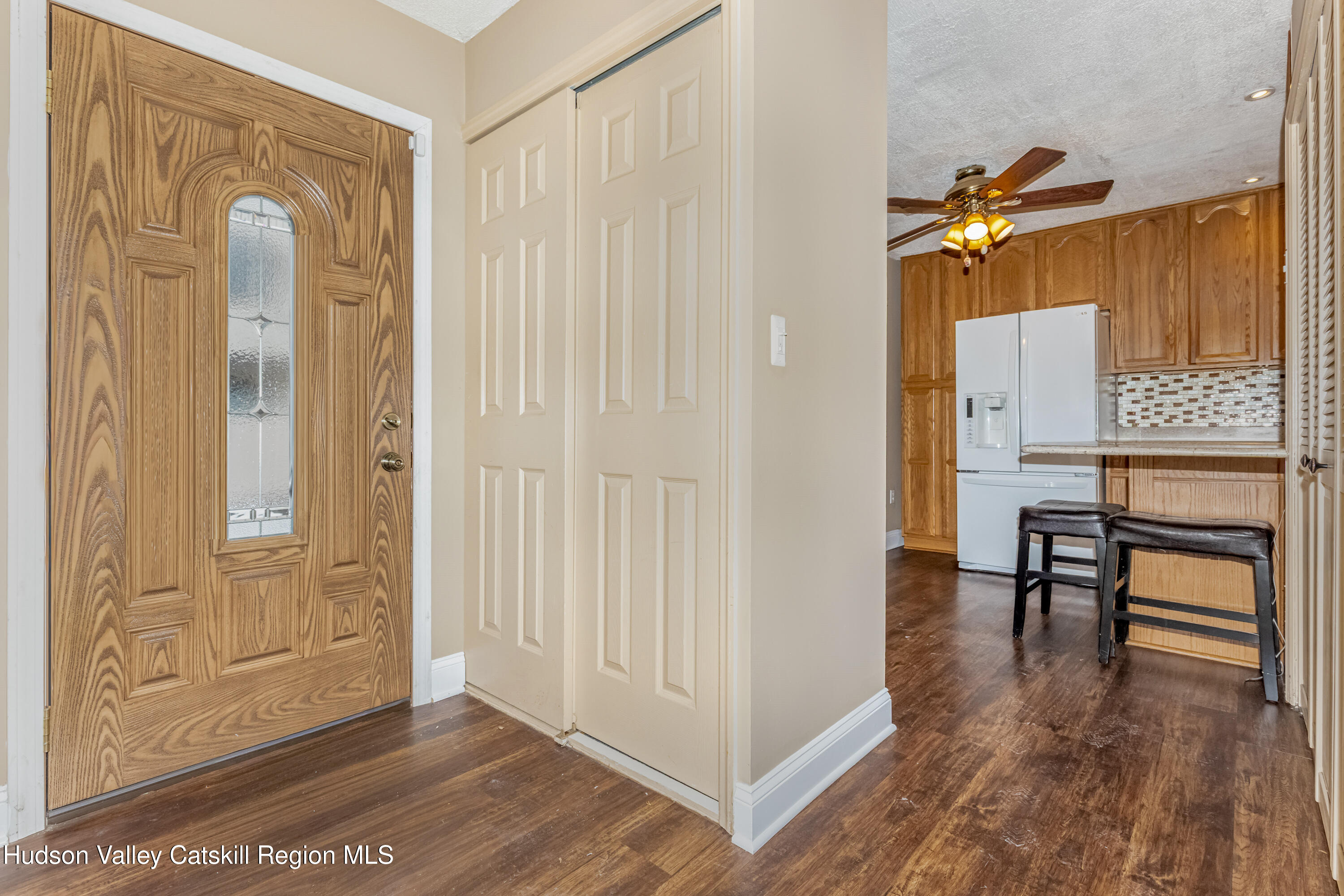 1907 Magnolia Walk Poughkeepsie, NY 12603 - Photo 4 of 36 a view of a livingroom with furniture and wooden floor