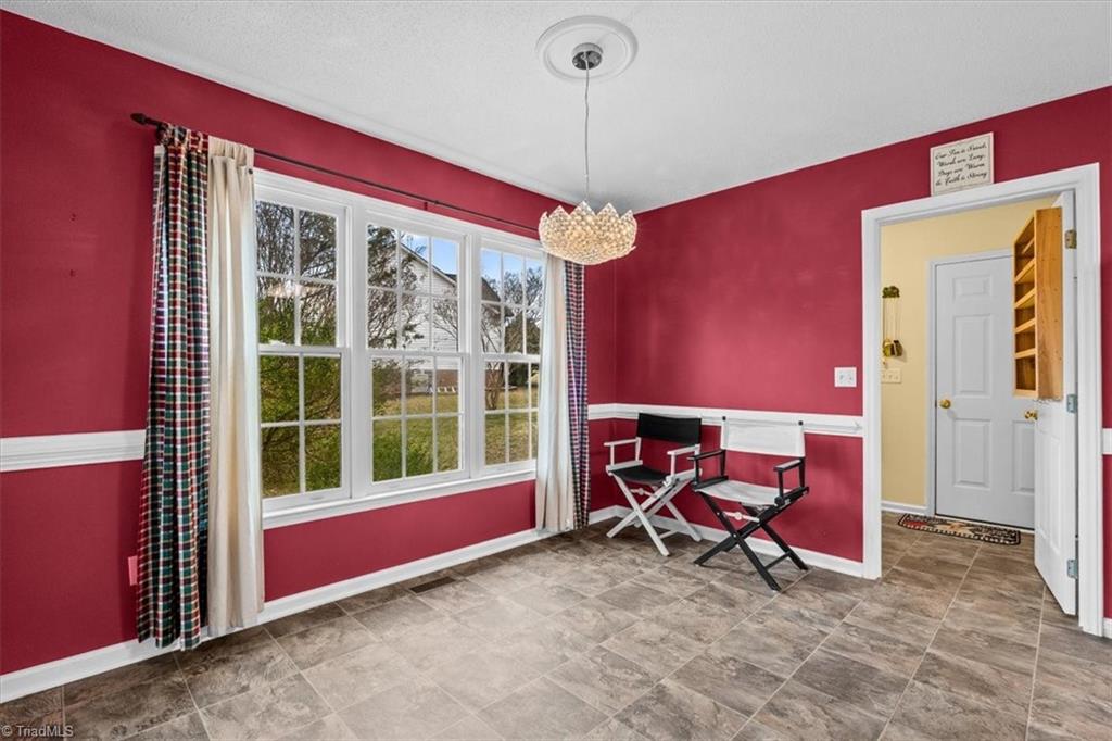 6933 Lawrence Farm Lane Randleman, NC 27317 - Photo 13 of 33 THIS ROOM COULD BE SO MANY THINGS... A DINING ROOM, A BREAKFAST ROOM OR A SITTING ROOM