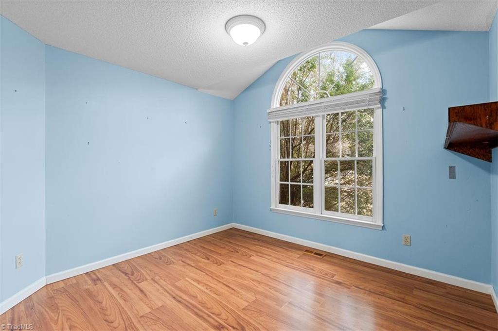 6933 Lawrence Farm Lane Randleman, NC 27317 - Photo 20 of 33 SECOND BEDROOM HAS THE WONDERFUL WINDOWS TO BEING IN THE SUNSHINE.