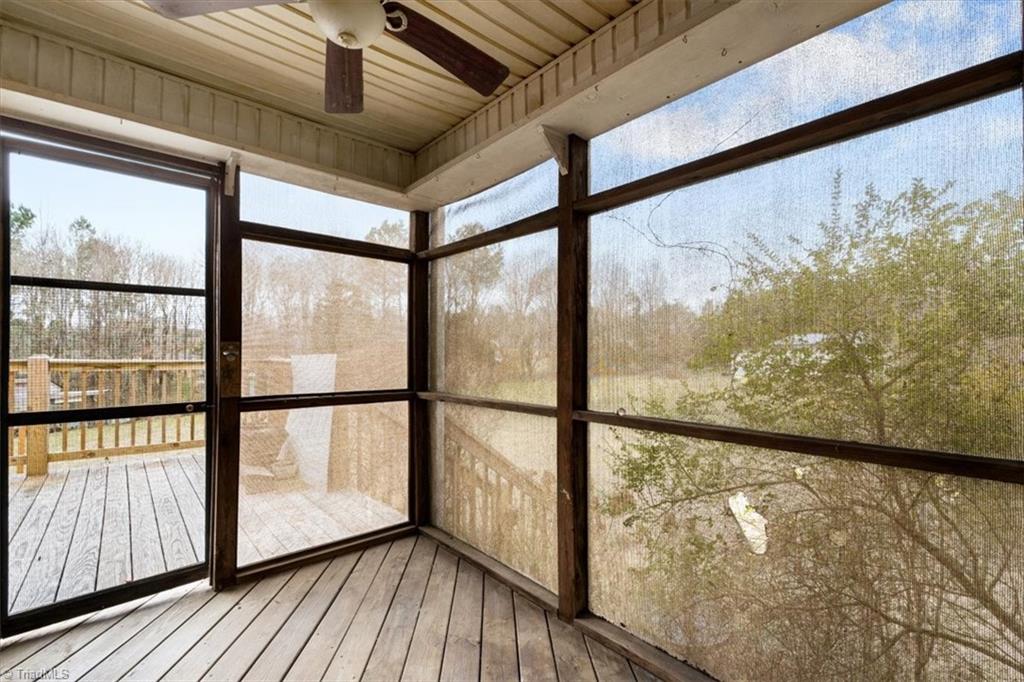 6933 Lawrence Farm Lane Randleman, NC 27317 - Photo 27 of 33 SCREEN PORCH TO ENJOY YOUR MONING COFFEE.