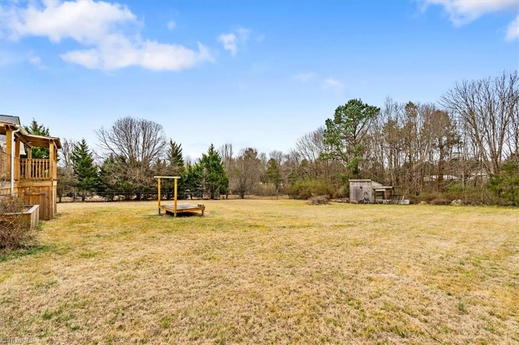 6933 Lawrence Farm Lane Randleman, NC 27317 - Photo 31 of 33 THIS HOME HAS A LARGE YARD.