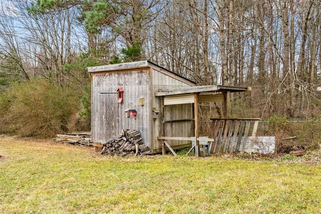 6933 Lawrence Farm Lane Randleman, NC 27317 - Photo 32 of 33 THIS IS THE STORAGE SHED FOR TOOLS AND ALL KIND OF THINGS.