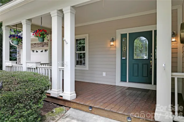 a front view of a house with a porch