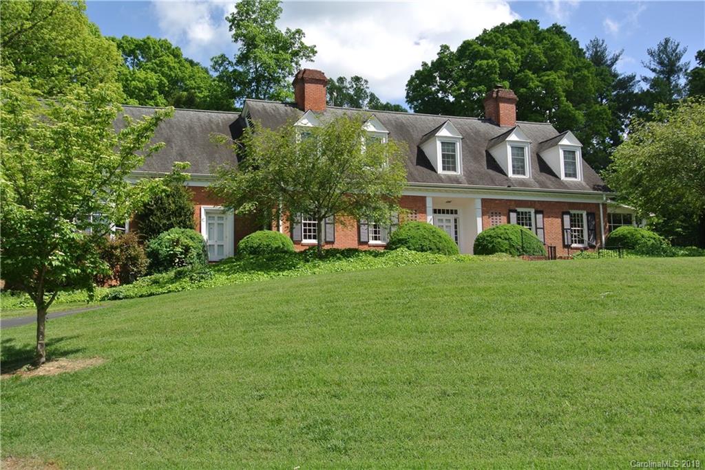 208 Pellyn Wood Road Rutherfordton, NC 28139 - Photo 3 of 18 a front view of a house with a garden