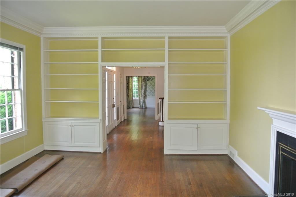 208 Pellyn Wood Road Rutherfordton, NC 28139 - Photo 6 of 18 a view of an empty room with a window and wooden floor