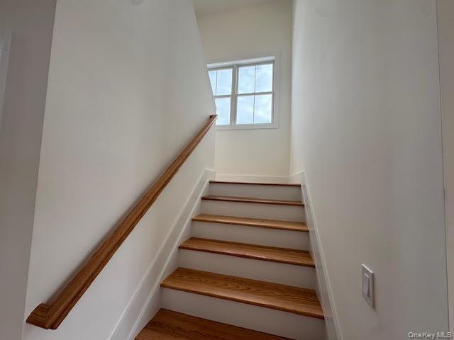11 Colonels Path Manorville, NY 11949 - Photo 27 of 49 very wide staircase to second floor