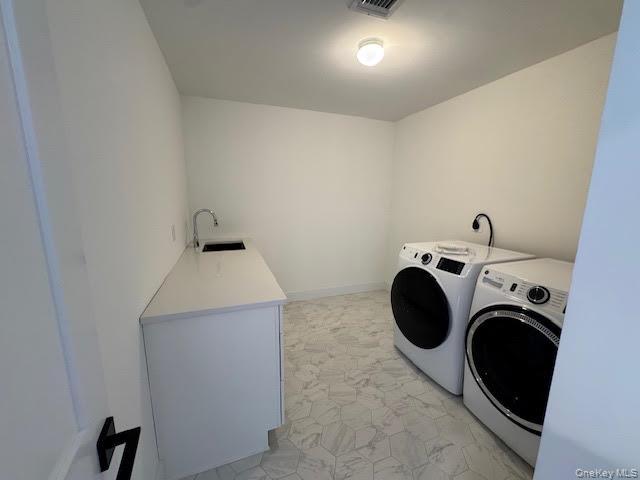11 Colonels Path Manorville, NY 11949 - Photo 35 of 49 Huge Laundry area featuring separate washer and dryer, sink and additional storage space and room to hang close to dry