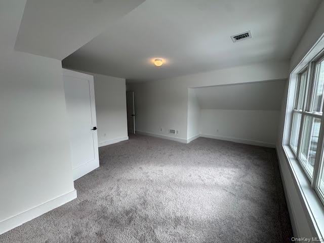 11 Colonels Path Manorville, NY 11949 - Photo 42 of 49 Unfurnished room with light colored carpet