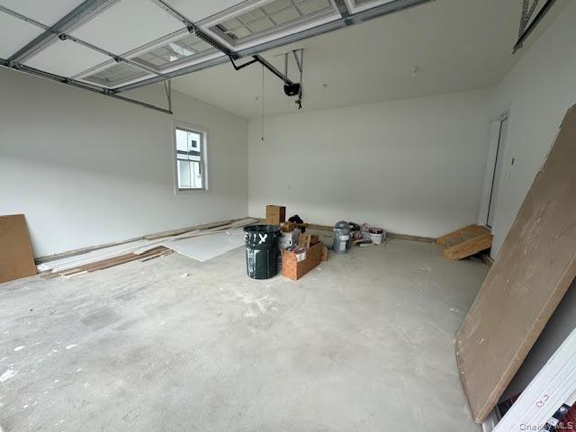 11 Colonels Path Manorville, NY 11949 - Photo 47 of 49 large garage with enough room for storage and 2 cars