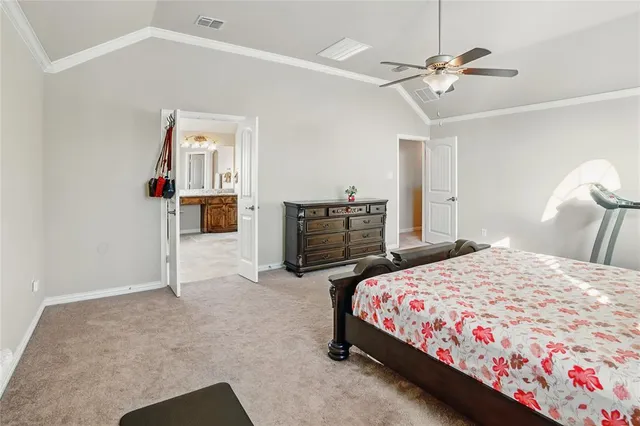 a large bathroom with a large tub and sink