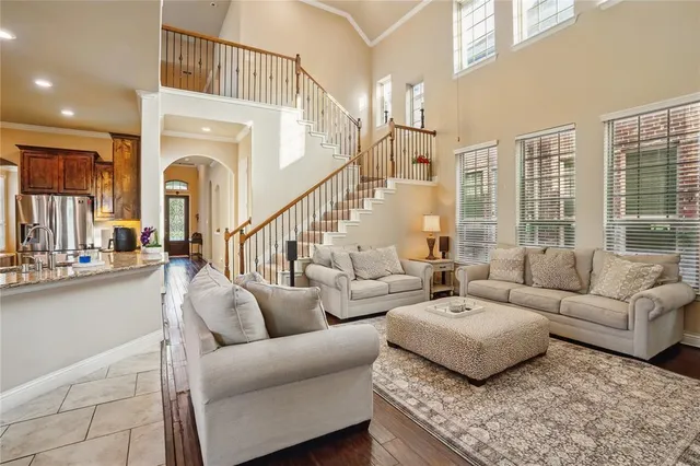 a view of a porch with wooden floor and windows