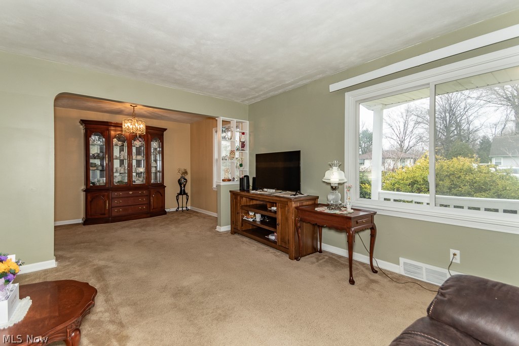 8144 Stockbridge Road Mentor, OH 44060 - Photo 5 of 36 Living room with loads of natural lighting