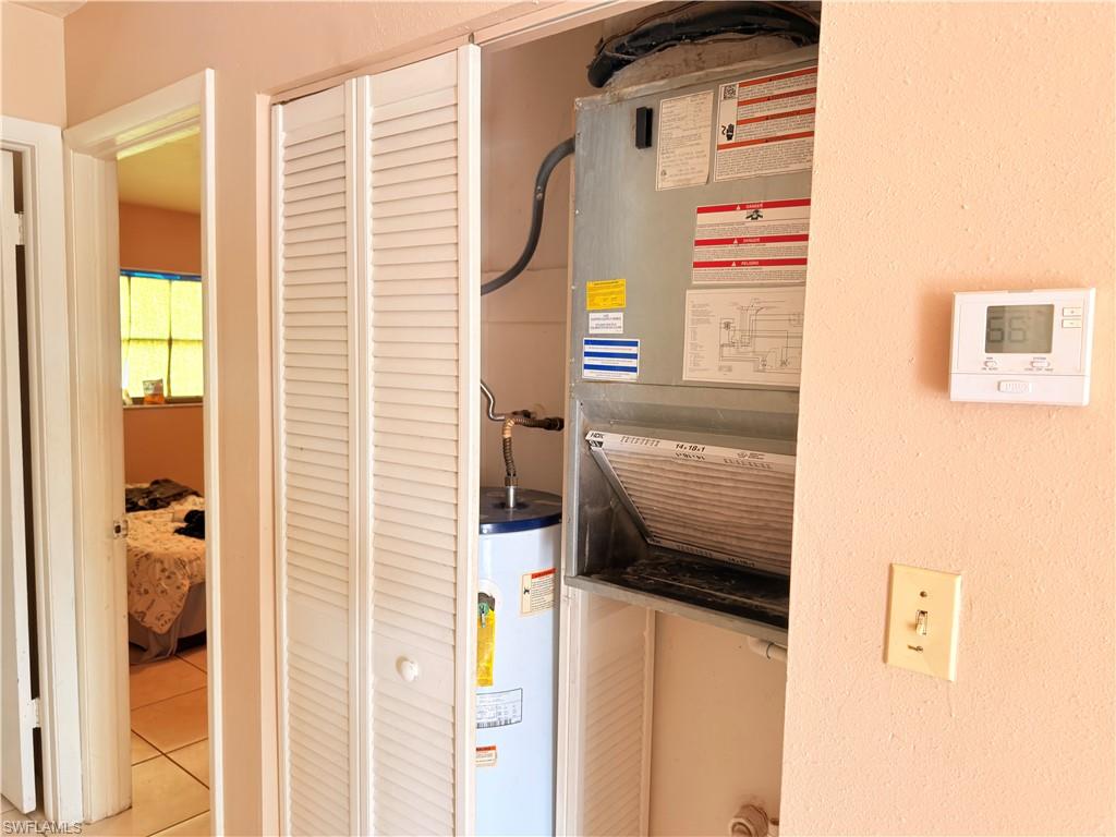 2241 Sunshine Boulevard Naples, FL 34116 - Photo 12 of 35 a bathroom with a shower and a window