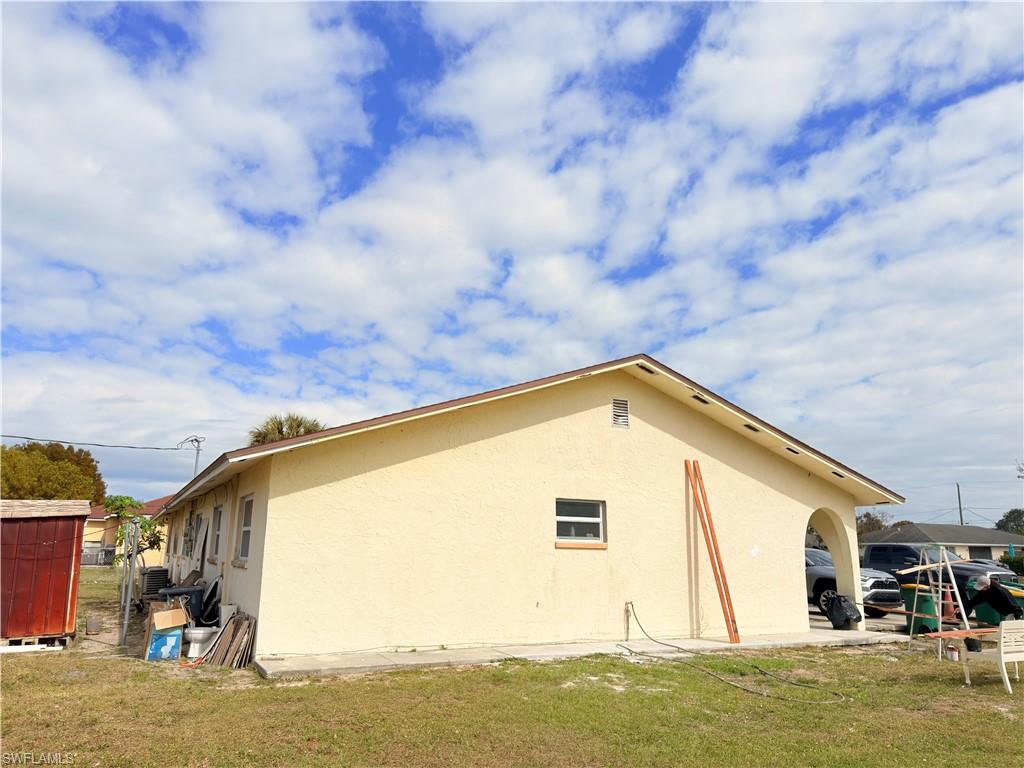 2241 Sunshine Boulevard Naples, FL 34116 - Photo 19 of 35 a view of swimming pool with an outdoor space