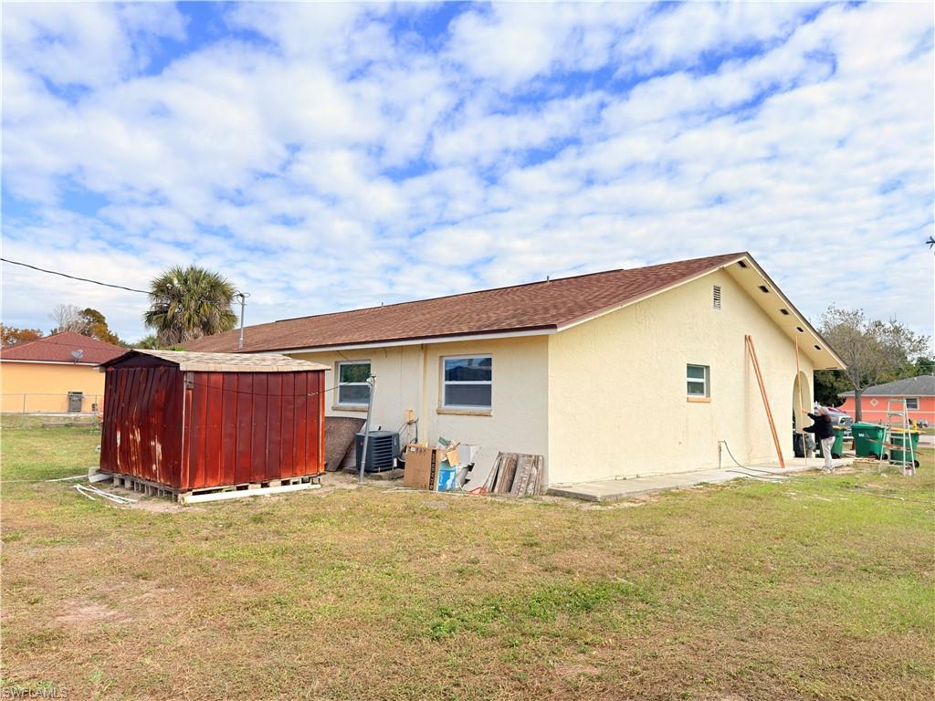 2241 Sunshine Boulevard Naples, FL 34116 - Photo 24 of 35 a view of a backyard of the house