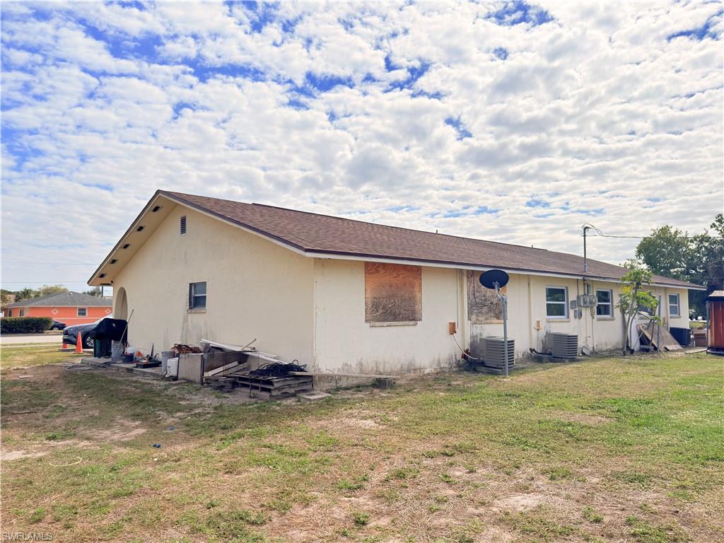 2241 Sunshine Boulevard Naples, FL 34116 - Photo 33 of 35 a view of a house with backyard
