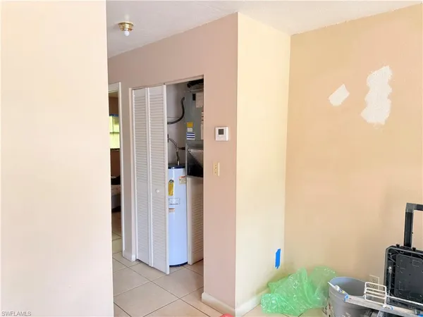 a white refrigerator freezer and a dishwasher sitting in a kitchen