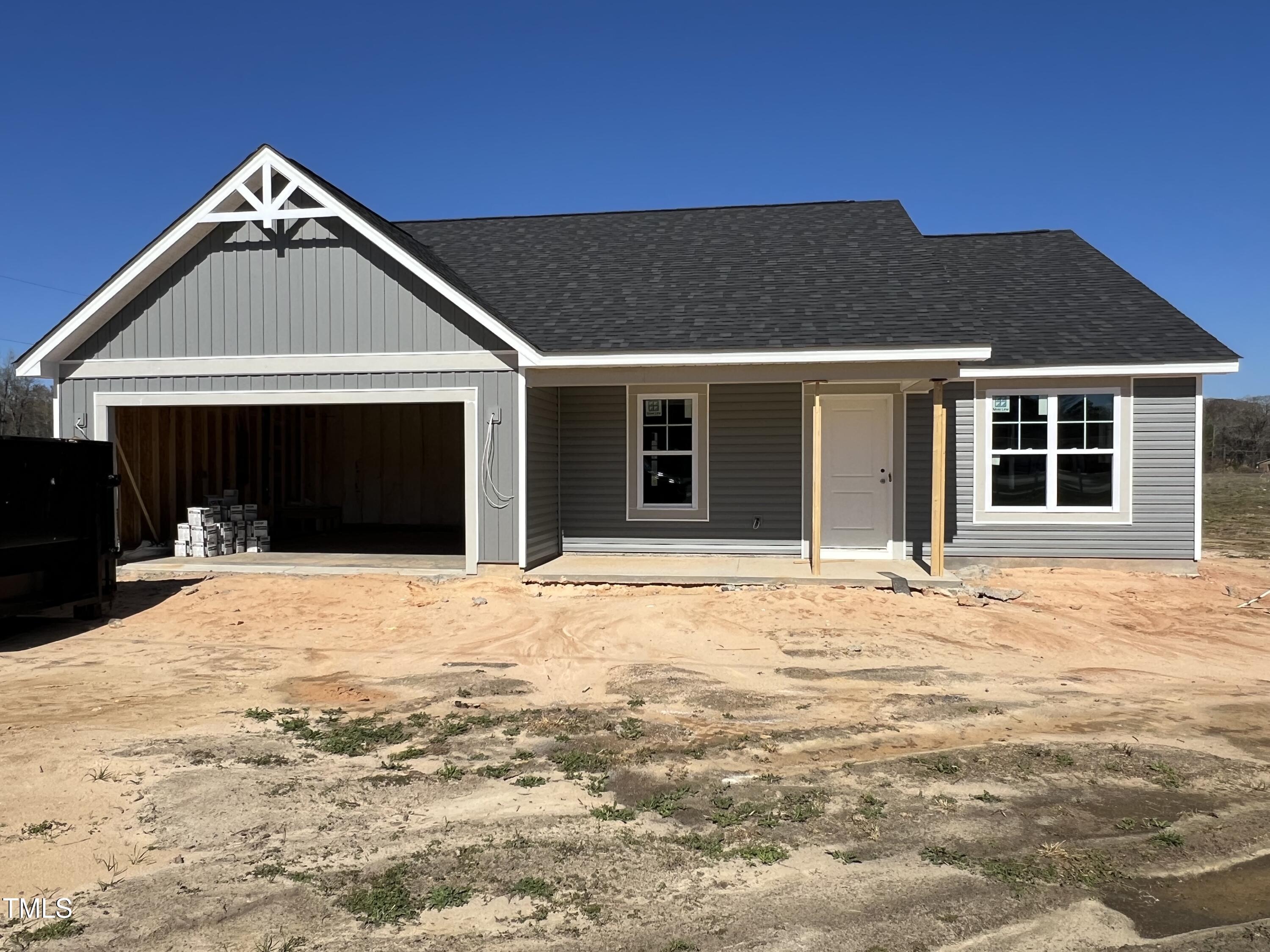 132 Dalton Drive Benson, NC 27504 - Photo 2 of 16 a front view of a house with a yard
