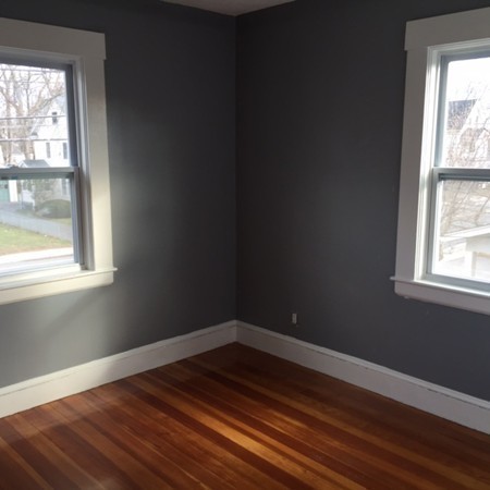 342 Franklin Street Framingham, MA 01702 - Photo 14 of 17 an empty room with wooden floor and windows