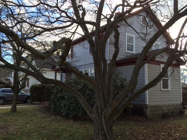 342 Franklin Street Framingham, MA 01702 - Photo 2 of 17 a house that has tree in front of it