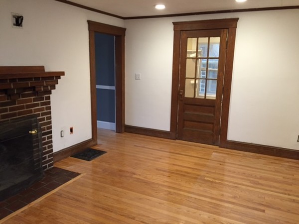 342 Franklin Street Framingham, MA 01702 - Photo 7 of 17 a view of an empty room with wooden floor and a window