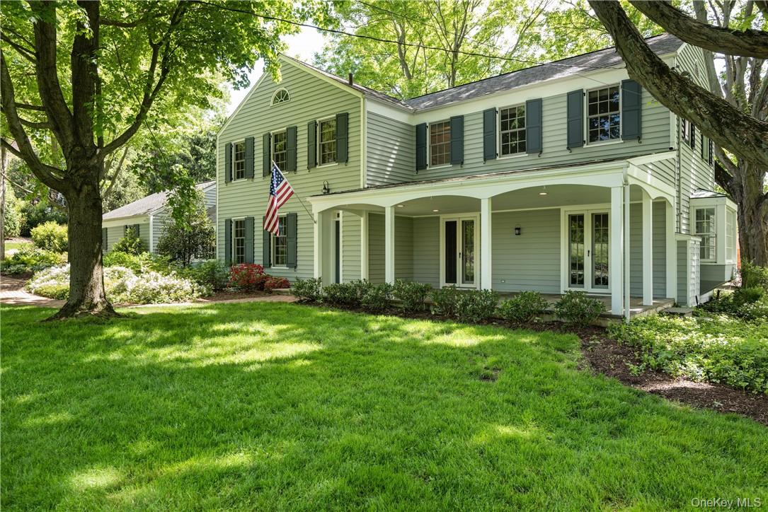 11 Sunset Lane Rye, NY 10580 - Photo 8 of 36 Beautiful covered porch to relax or entertain on a hot afternoon.