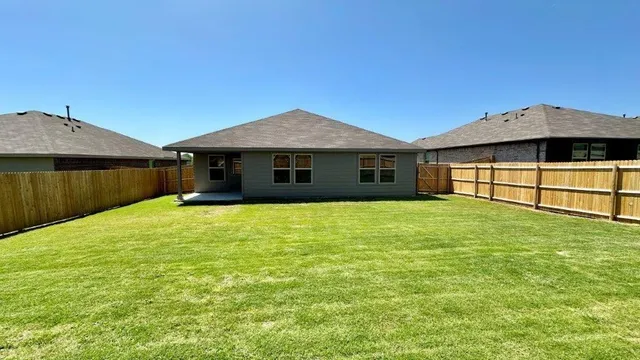 a house view with a garden space