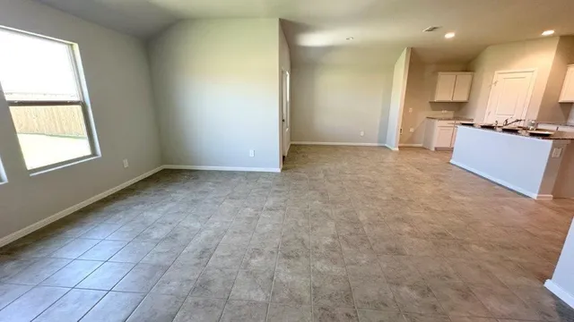 a kitchen with appliances and cabinets