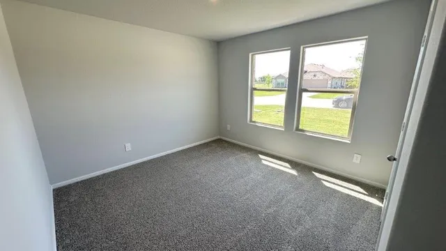 a bathroom with a double vanity sink and mirror