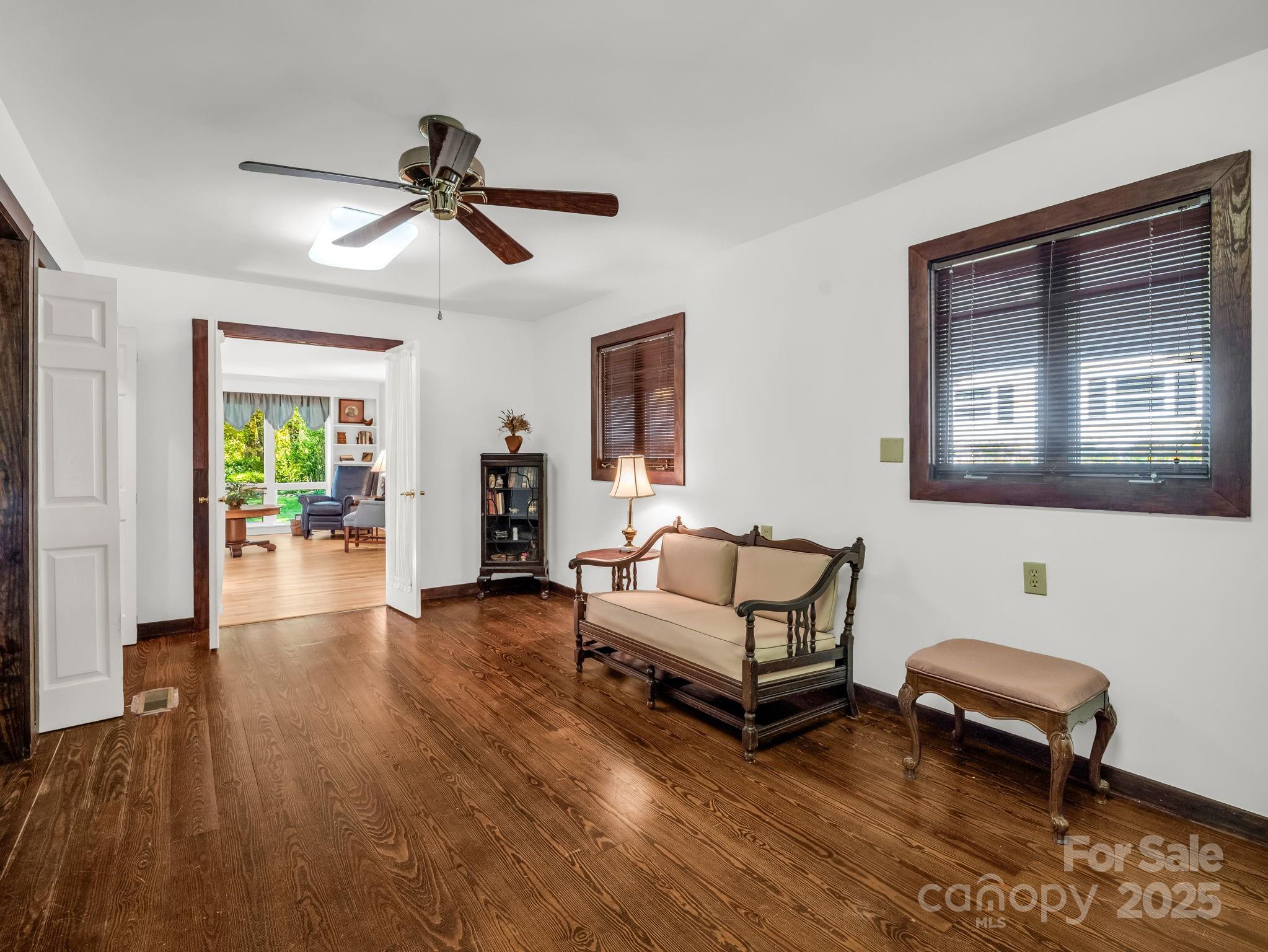 821 Warrior Drive Tryon, NC 28782 - Photo 17 of 44 a living room with furniture and a wooden floor
