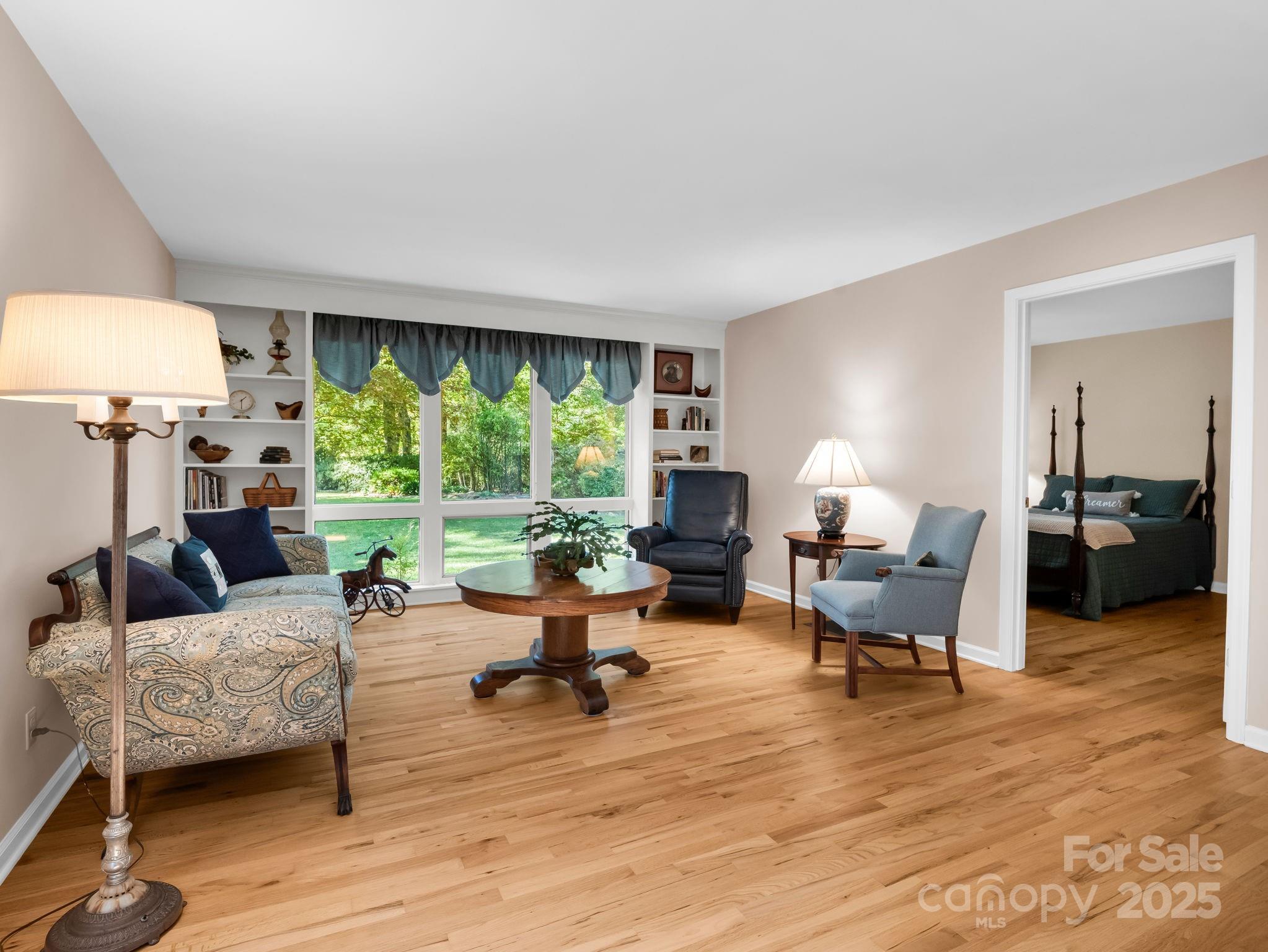 821 Warrior Drive Tryon, NC 28782 - Photo 19 of 44 a living room with furniture and a large window