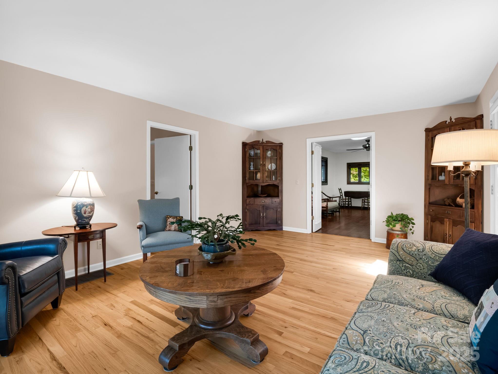 821 Warrior Drive Tryon, NC 28782 - Photo 20 of 44 a living room with furniture and wooden floor