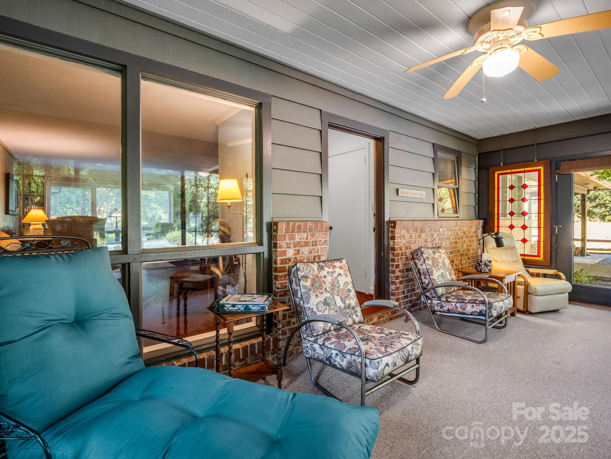 821 Warrior Drive Tryon, NC 28782 - Photo 26 of 44 a living room with furniture and a large window
