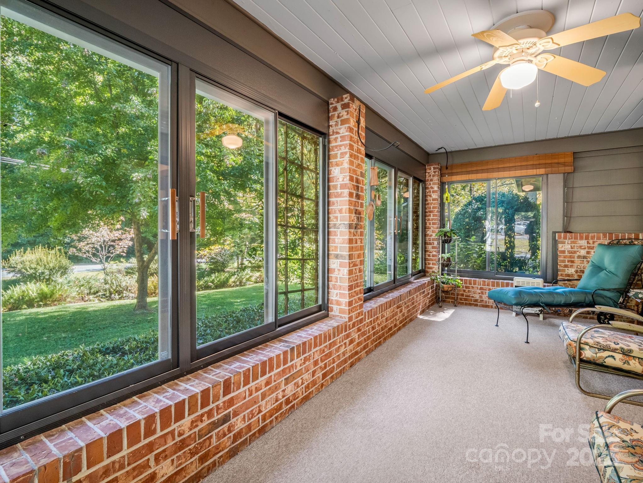 821 Warrior Drive Tryon, NC 28782 - Photo 28 of 44 a room with furniture and a large window