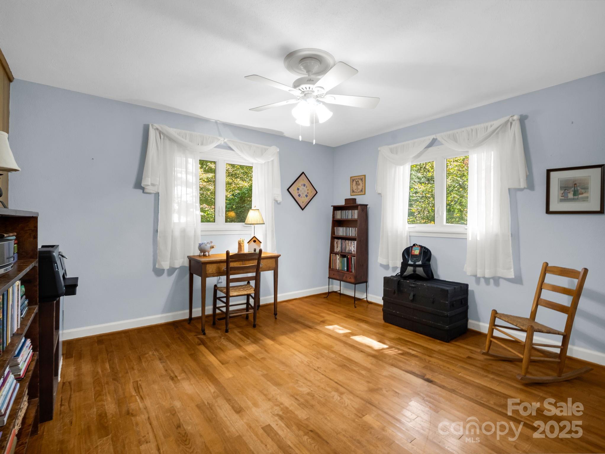 821 Warrior Drive Tryon, NC 28782 - Photo 32 of 44 a living room with furniture and a wooden floor