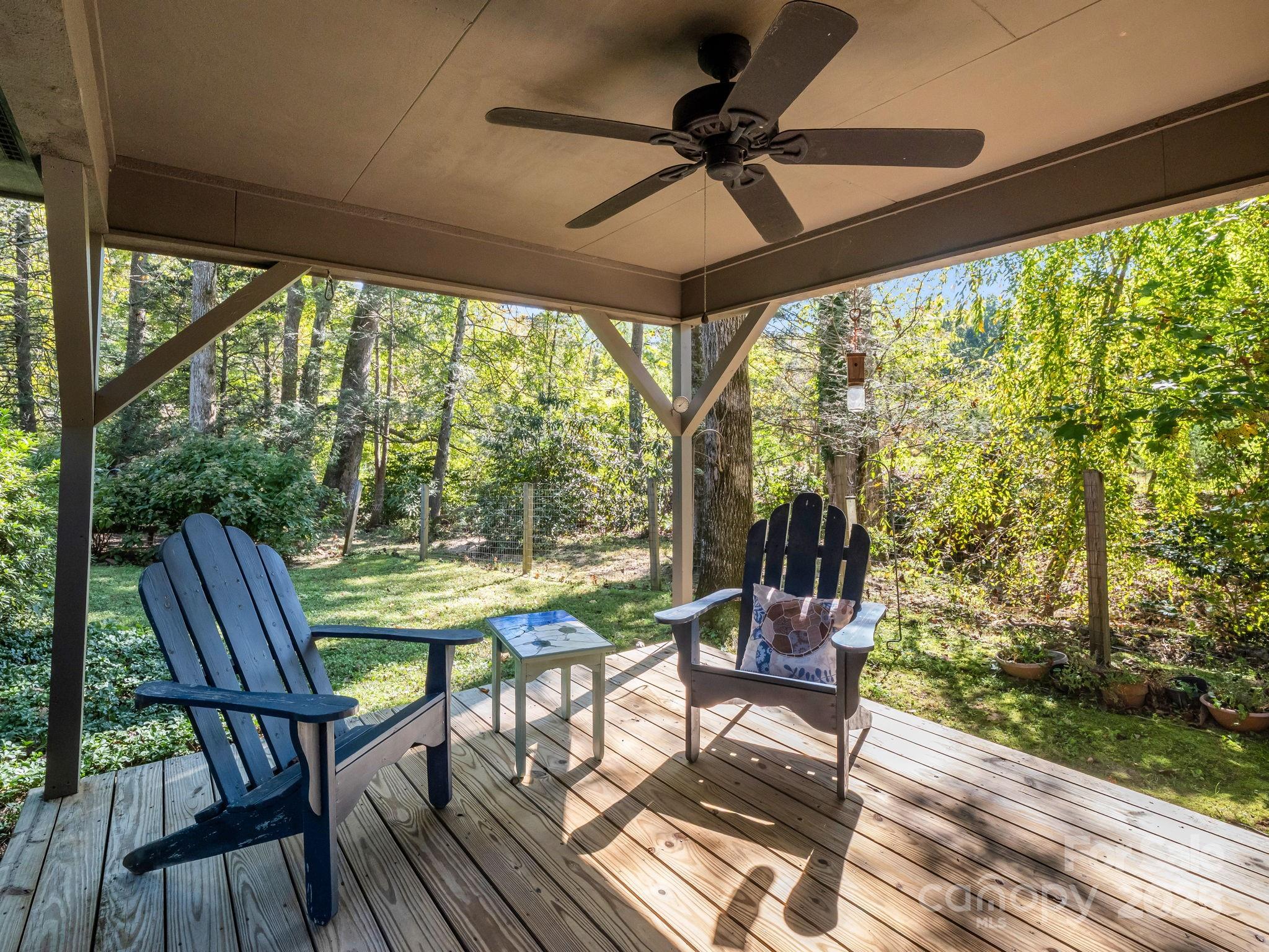 821 Warrior Drive Tryon, NC 28782 - Photo 39 of 44 a view of a dining room with furniture window and outside view