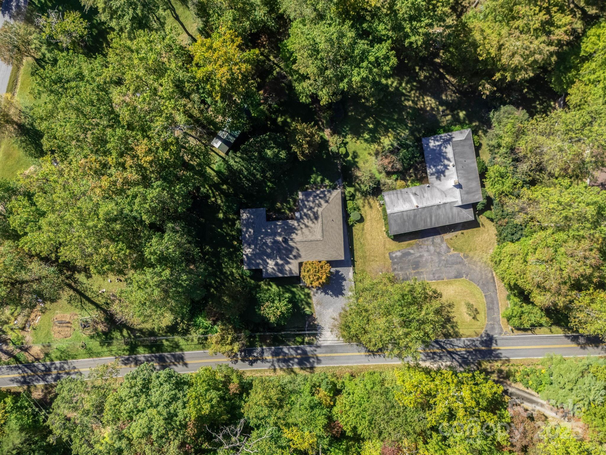 821 Warrior Drive Tryon, NC 28782 - Photo 41 of 44 an aerial view of a house with a yard