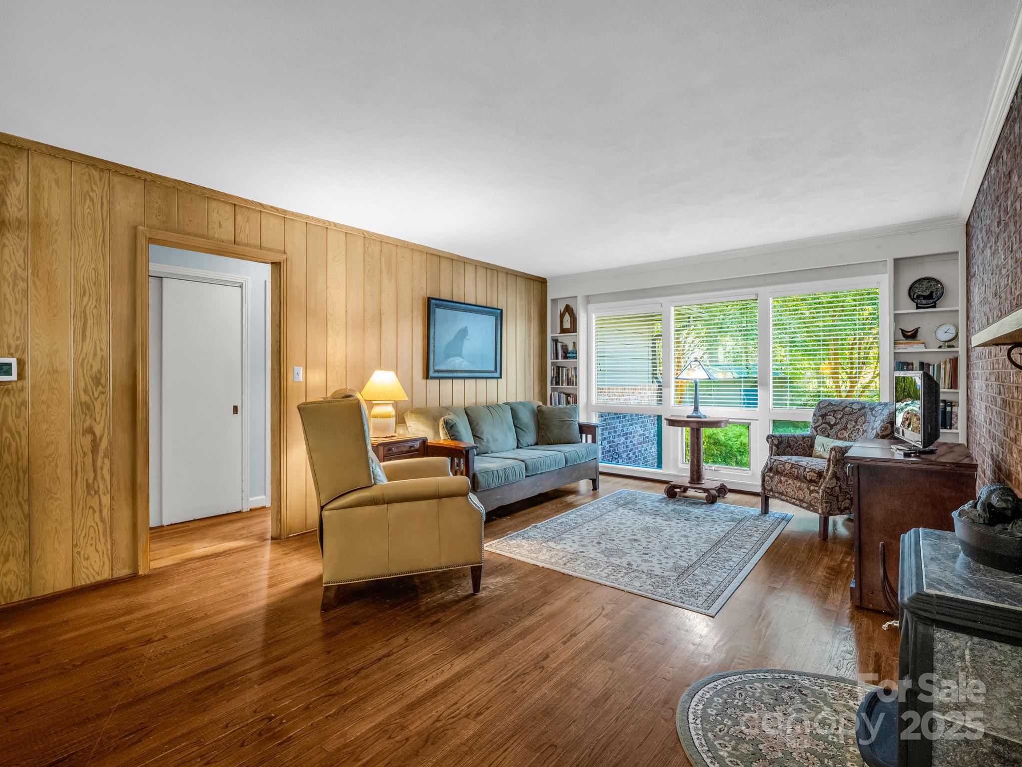 821 Warrior Drive Tryon, NC 28782 - Photo 8 of 44 a living room with furniture and a large window