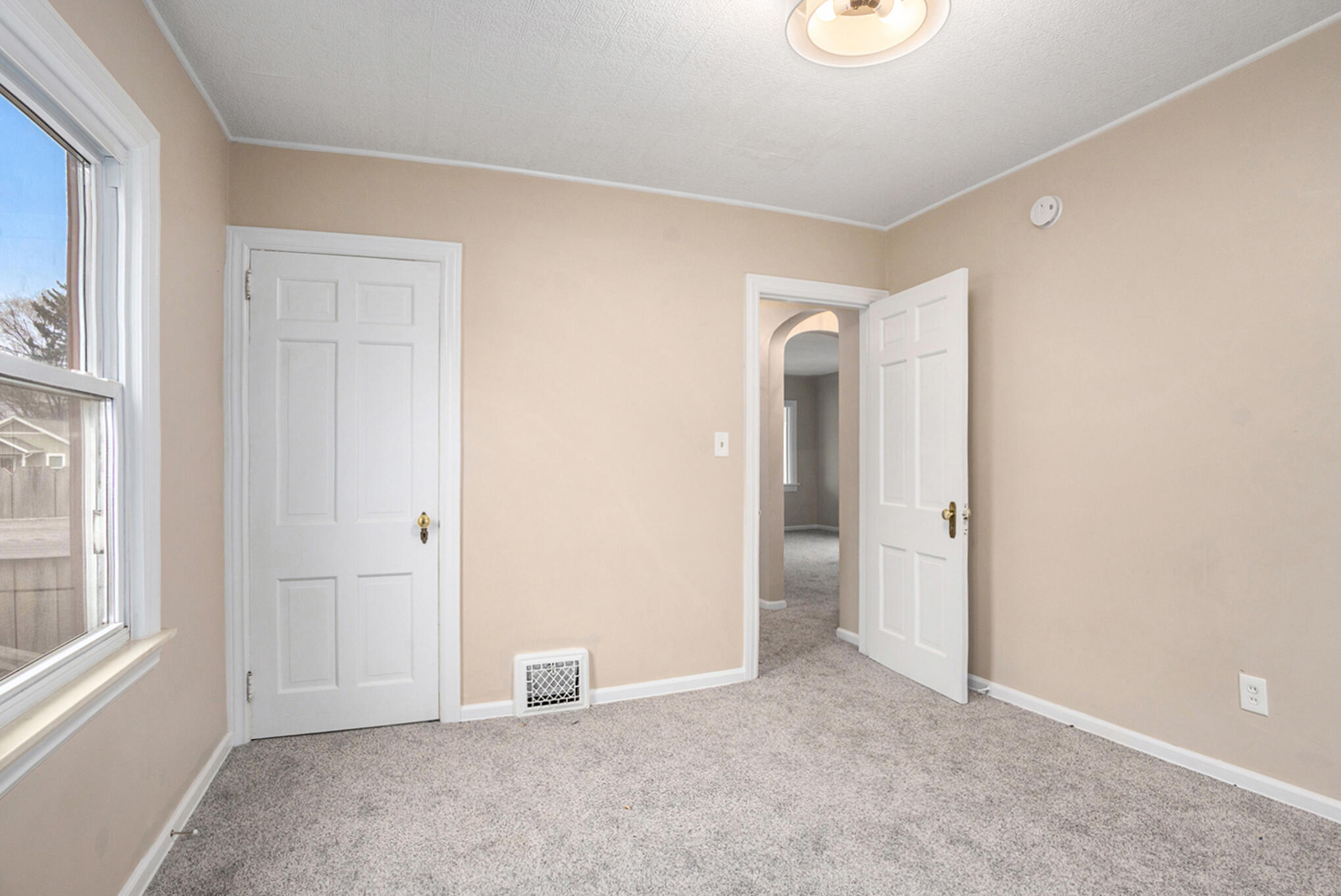 1554 Rathbone Street Southwest Wyoming, MI 49509 - Photo 11 of 16 Bedroom with loads of light