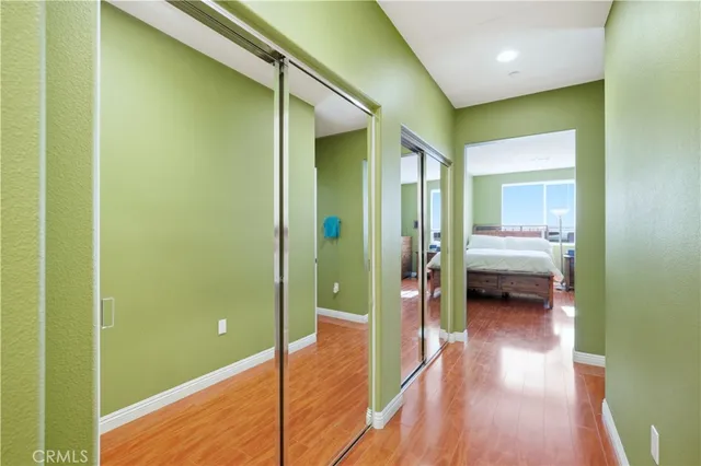 a en suite bathroom with a sink and a large mirror