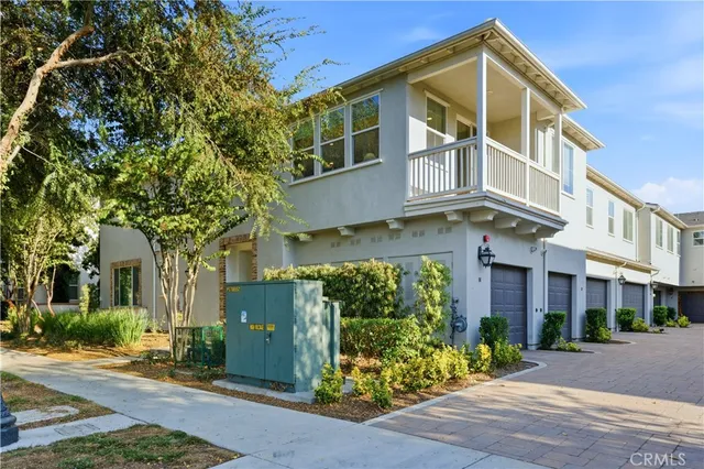 a front view of a multi story residential apartment building