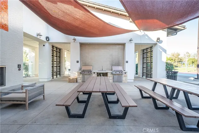 a very nice looking living room with a large window